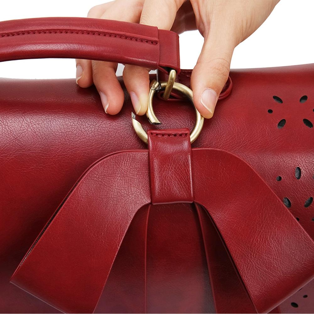 Elegant handväska med fluga från Grace